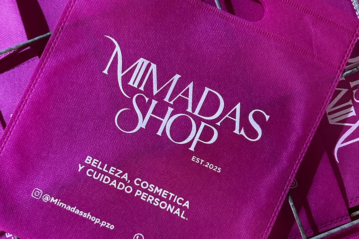 Bolsa ecológica fucsia con logo blanco estampado